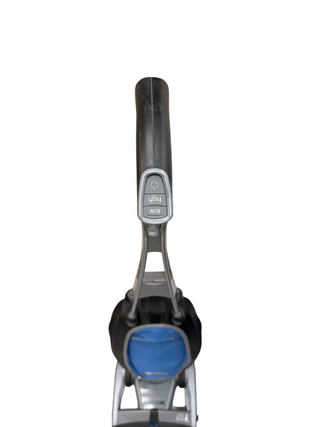 A close-up, top-down view of the handle and upper section of an Oreck Magnesium refurbished vacuum by Imagine Sewing & Vacuum, showing labeled controls and a blue accent.