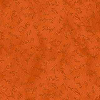 Robin Kingsley Spooky Stitches MAS10876-O Spooky Words Orange Fabric by 47-EE Schenck features handwritten Halloween phrases like “Spooky” and “Trick or Treat”—ideal for festive quilting or crafts.