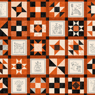 A quilt made with 47-EE Schenck’s Robin Kingsley Spooky Stitches MAS10879-O Running Blocks Orange fabric features a patchwork pattern in orange, black, and cream with embroidered Halloween designs and geometric blocks.