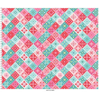 The Maywood Studios Kimberbell Sweet Shoppe Candy Kaleidoscope Multi MAS11020-Z Fabric features a colorful diamond patchwork with geometric floral designs in red, pink, blue, and white tones, shown with a ruler for scale.