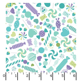 Kimberbell Maywood Studios Sweet Shoppe Candy Salad White MAS11022-W Fabric Yardage by Maywood Studios features assorted pastel candies, wrapped sweets, lollipops, and hearts on a white background with ruler scales—ideal for quilting projects.