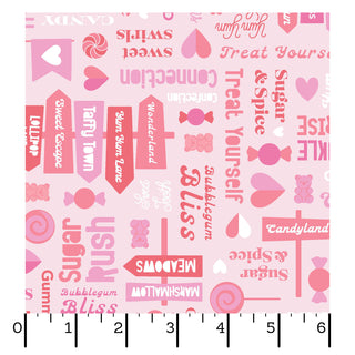 Kimberbell Maywood Studios Sweet Shoppe Sweet Streets Pink MAS11023-P fabric features candy-themed words and icons in red, white, and pink. A ruler at the bottom shows inch measurements. Ideal quilting cotton for sweet projects!.