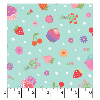 Kimberbell Maywood Studios Sweet Shoppe Cupcakes Blue MAS11024-B Fabric features cupcakes, strawberries, cherries, flowers, and small leaves on light blue 100% cotton; ruler shows 6-inch width.