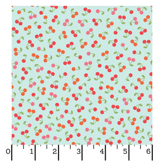 Kimberbell Maywood Studios Sweet Shoppe Cherries Blue MAS11026-B features red and pink cherries with green leaves on light blue, shown with a 0–6 inch ruler. Ideal quilting cotton for your projects from Maywood Studios.