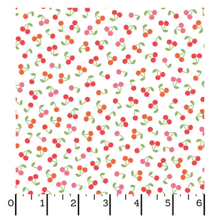 Kimberbell Maywood Studios Sweet Shoppe Cherries White MAS11026-W Fabric features a white background with red, pink, and orange cherries and green stems. A ruler along the bottom measures up to 6 inches. Ideal for quilting cotton projects.