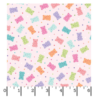 Kimberbell Maywood Studios Sweet Shoppe Gummy Bears Pink MAS11029-P Fabric Yardage features colorful gummy bear illustrations and pastel dots on light pink—ideal for candy-inspired quilting or sewing projects. Ruler in image shows inches.