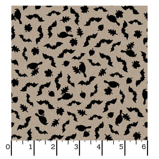 Maywood Studios Pumpkin Grove BATS AND CROWS TAN/BLACK MAS11185-TJ fabric yardage by 47-EE Schenck features tan fabric with black silhouettes of bats, crows, candy, and leaves in a scattered pattern; a ruler along the bottom edge displays dimensions in inches—available by the yard with free shipping.
