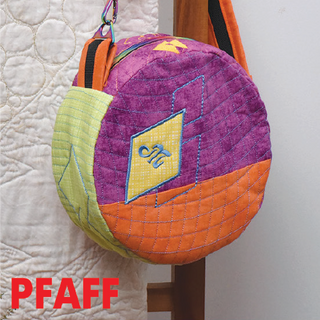 The Ravish Me 'Round Bag, a round quilted bag with purple, orange, and green patchwork-in-the-hoop Pi designs, hangs by a quilt. "Pfaff Event" logo appears in red at the bottom left. Join the 2-day in-person event Nov 7-8, 10-5 pm.