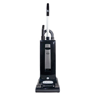 The Sew & Vac Sebo Automatic X4 is a black upright vacuum cleaner with a handle, hose, and control panel, featuring hospital-grade filtration and shown from the front against a white background.