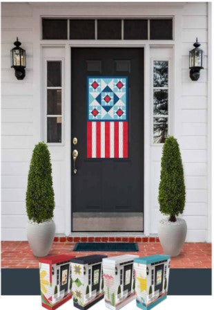 A front door with an American flag on it, adorned with the monthly Sew & Vac Door Banner Kit of the Month SAL (sew-Anne Beale Yancey) and Wimmer's touch, making it a perfect addition to the virtual SAL community.