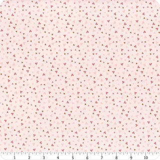 Riley Blake Baby Girl Hearts Pink C16776-PINK fabric by Lori Whitlock features scattered rose gold metallic triangles on light pink. A ruler shows inch measurements along the edge. Ideal for baby girl sewing projects. Brand: 56-Riley Blake.