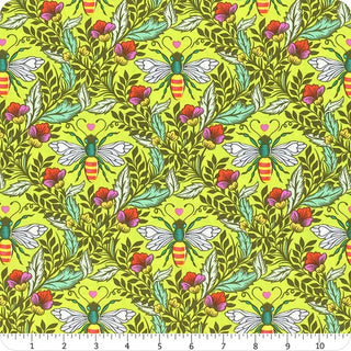 Tula Pink Full Moon Forest II PWTP.248-ENCHANTED Shake Your Honey Maker quilting cotton fabric by Free Spirit TULA PINK features a lively repeating pattern of colorful bees, leafy greenery, and pink flowers on a vibrant yellow background. A ruler along the bottom edge shows measurements in inches, making this fabric ideal for your next Tula Pink-inspired project.