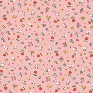 Minki Kim Cotton Nook Pretty Pink C17974-PINK by 56-Riley Blake features a pink fabric with a nostalgic floral design, showcasing evenly spaced red, yellow, white, pink, and blue flowers among green leaves—perfect for keepsake sewing projects or adding charm to quilts.