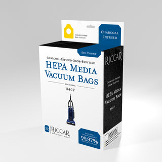 Wimmers Sewing & Vacuum offers the Riccar Charcoal-Lined HEPA Bag R40P 6PK for Vacuum, specially designed for model R40P. These bags are infused with charcoal to fight odors and effectively capture 99.97% of particles. This set of six bags is trusted by vacuum service experts to enhance your vacuum's performance.