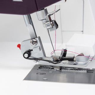 A Pfaff Admire Air 7000 sewing machine with a needle attached to it.