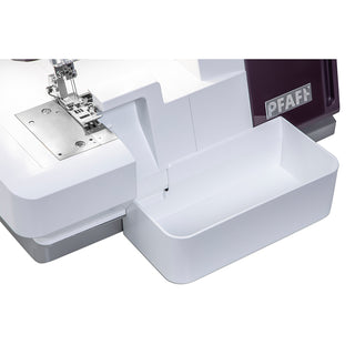 A Pfaff Admire Air 7000 sewing machine with a drawer on it.