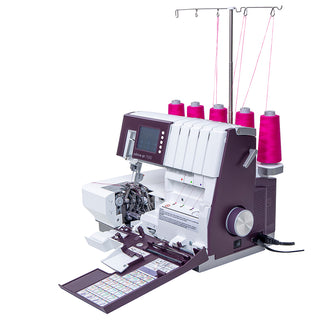 A Pfaff Admire Air 7000 sewing machine with several needles and threads.