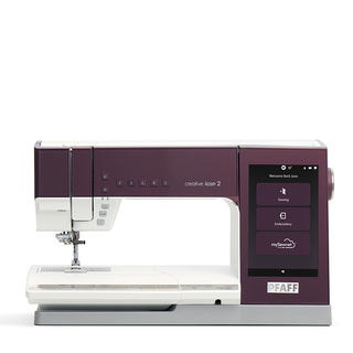A PFAFF sewing machine with a purple color, the Pfaff Creative Icon 2 - Purple Aurora.