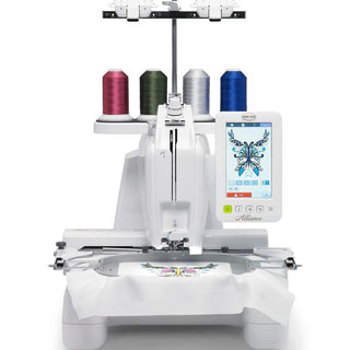 A white Baby Lock Alliance Embroidery Machine with two embroidery machines and a computer.