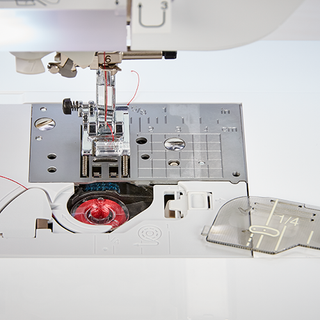 A Baby Lock Aerial Sewing and Embroidery Machine with a needle attached to it.