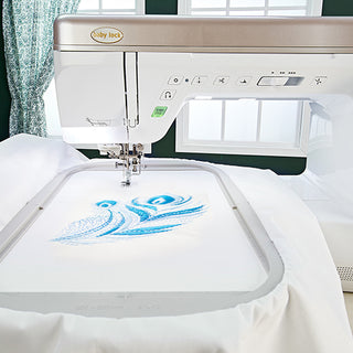 A Baby Lock Aerial Sewing and Embroidery Machine with a design on it.