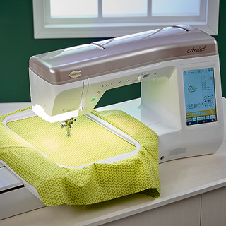 A Baby Lock Aerial Sewing and Embroidery Machine on a table.