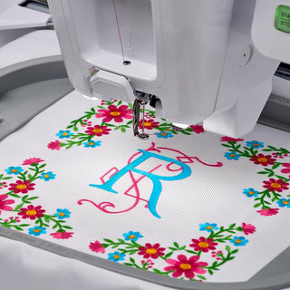 A Baby Lock Alliance Embroidery Machine with a monogram on it.