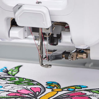 A Baby Lock Alliance Embroidery Machine with a butterfly on it.