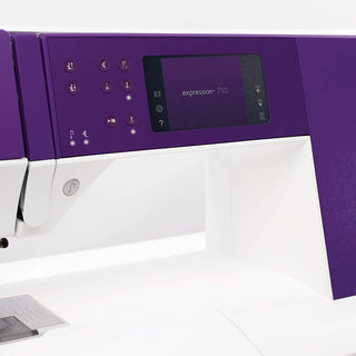 A PFAFF Expression 710 Sewing and Quilting Machine in purple and white.