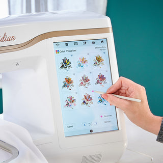 A person using a Baby Lock Meridian Embroidery Only Machine with an ipad.