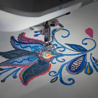 A Baby Lock Meridian Embroidery Only Machine is being used to create a floral design.