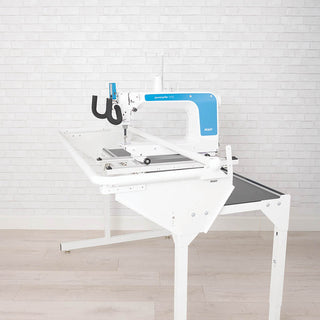 A PFAFF sewing table with a blue and white design.