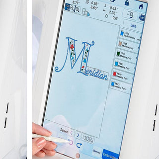 A person is using a Baby Lock Meridian Embroidery Only Machine to draw a letter on a piece of paper.