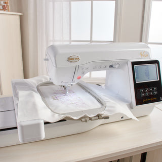 A Baby Lock Vesta Sewing & Embroidery Machine on top of a table.