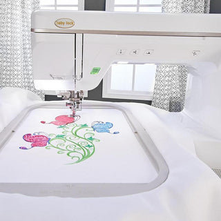 A Baby Lock Pathfinder Embroidery Machine with an embroidery design on it.