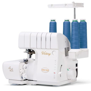 A Baby Lock Victory Serger sewing machine with blue spools.